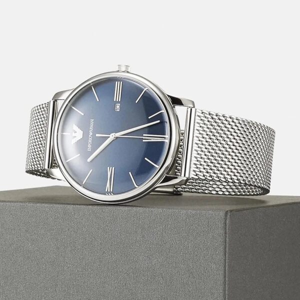 Emporio Armani AR11571 watch on wrist with blue dial and silver mesh bracelet