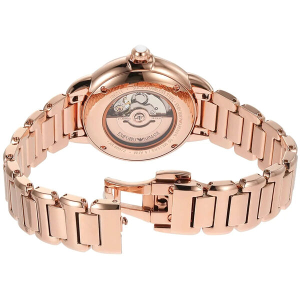 Caseback of Emporio Armani Mia watch revealing automatic movement through open heart skeleton window