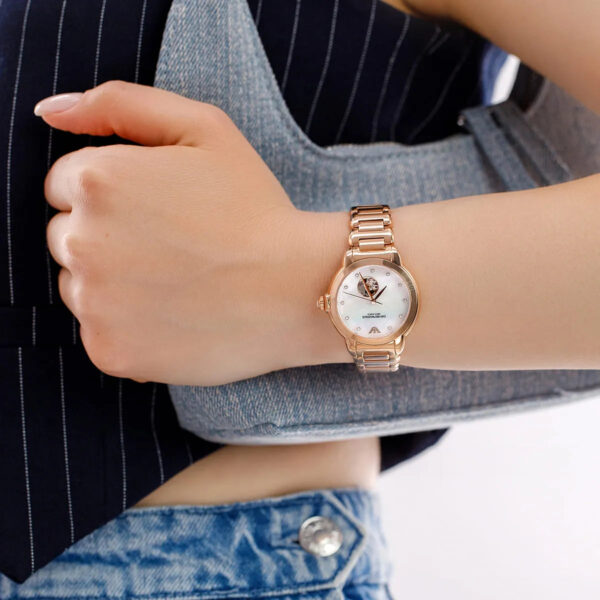 Emporio Armani Mia automatic watch worn on wrist with rose-gold metal bracelet