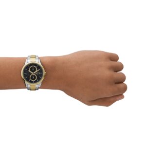 Armani Exchange Dante watch worn on wrist displaying black dial and two-tone bracelet