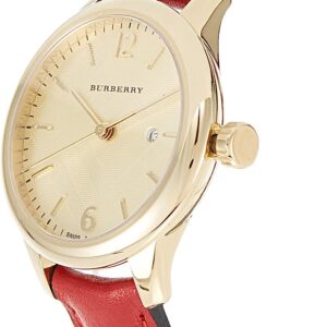 Burberry The Classic watch at angle showing cream dial, gold case, and burgundy leather strap