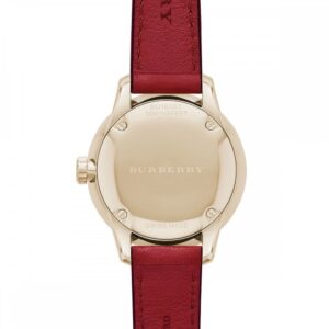 Burberry The Classic watch caseback showing gold-tone stainless steel case and burgundy leather strap