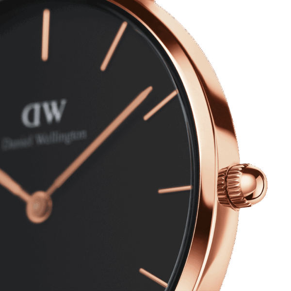 Side angle view of rose gold case with black dial and rose gold hour markers