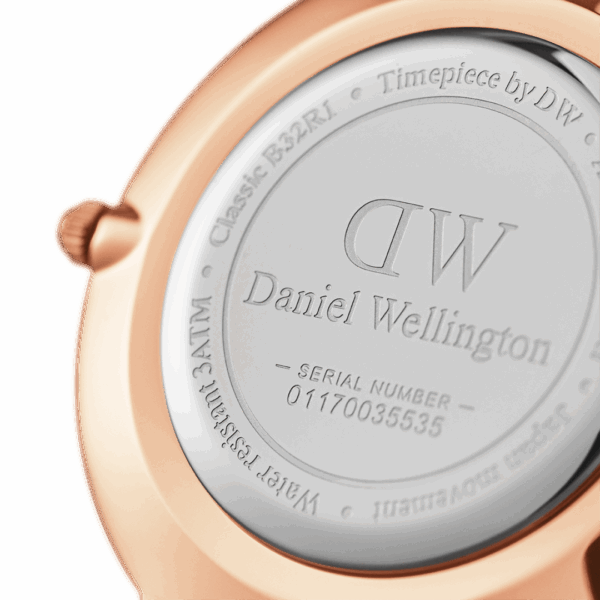 Case back showing DW Daniel Wellington logo and serial number engraved on rose gold