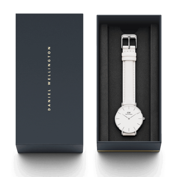 Daniel Wellington Petite Bondi 32mm watch in presentation box with owner's guide and accessories