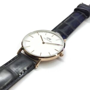 Daniel Wellington Reading 36mm watch worn on wrist with black leather strap