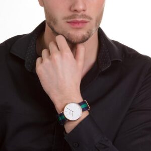 Daniel Wellington Warwick 40mm gold watch worn on wrist with white dial visible