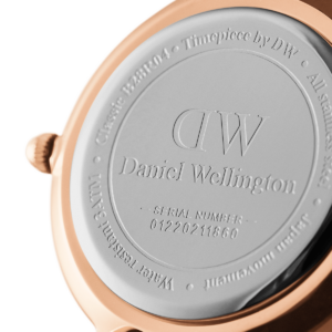 Daniel Wellington caseback showing engraved branding and serial number 04220211660