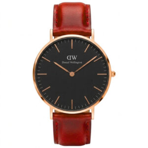 Daniel Wellington St. Mawes 28mm watch with black dial, rose gold case, and red leather strap