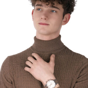 Emporio Armani Gianni XL two-tone chronograph watch worn on wrist against brown turtleneck