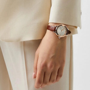 Emporio Armani Mia AR11525 watch worn on wrist with brown leather strap