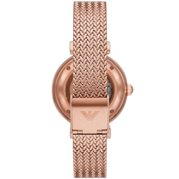 Rose gold caseback showing open movement and mesh strap attachment