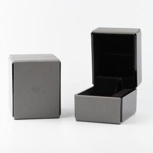 Emporio Armani watch packaging with gray exterior box and black interior watch case