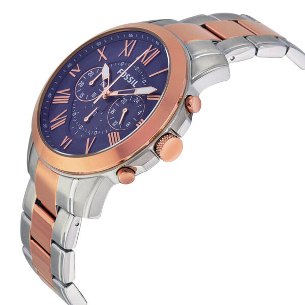 Side angle view of Fossil Grant chronograph showing two-tone metal bracelet and rose gold bezel with blue dial