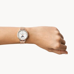 Fossil Jacqueline rose gold women's watch worn on wrist showing sun-moon dial
