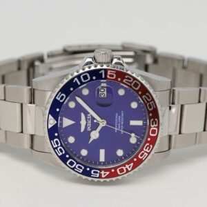 Invicta Pro Diver watch on wrist showing full stainless steel bracelet and dial