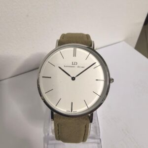 Lorenzen Dilimi watch with beige suede strap displayed on stand