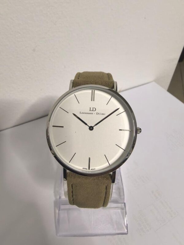 Lorenzen Dilimi watch with beige suede strap displayed on stand