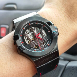 Maserati R8821108008 automatic skeleton watch worn on wrist showing black case and dial