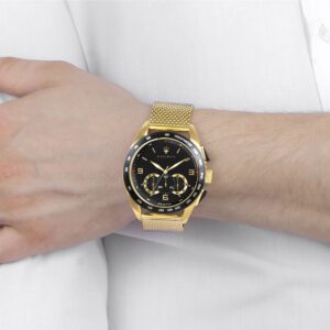 Maserati Traguardo chronograph watch worn on wrist with gold mesh bracelet