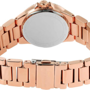 Michael Kors Camille watch worn on wrist, displaying rose gold case and dark grey dial