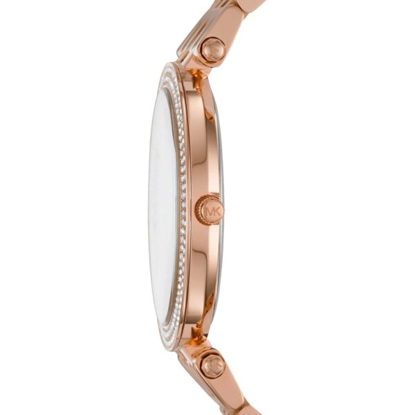Side view of Michael Kors Darci watch showing rose gold-tone case and crystal bezel
