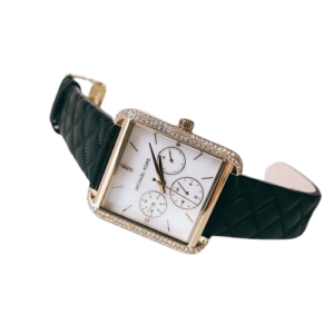 Michael Kors Drew watch worn on wrist, displaying white dial with chronograph subdials
