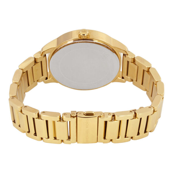 Michael Kors Kinley MK6209 caseback displaying gold-tone stainless steel case and bracelet