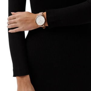 Michael Kors Addyson MK2947 watch worn on wrist with white dial and pink strap