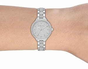 Michael Kors Slim Runway pavé silver-tone watch on woman's wrist