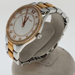 Side angle view of Michael Kors MK4483 watch on display stand