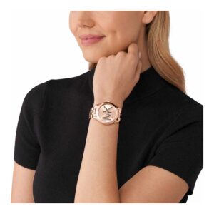 Michael Kors Slim Runway rose gold watch worn on wrist, on-wrist lifestyle shot