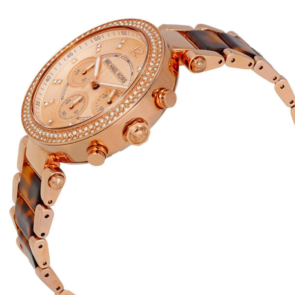 Michael Kors Parker watch angled view showing rose-gold case, chronograph subdials, and tortoise acetate bracelet