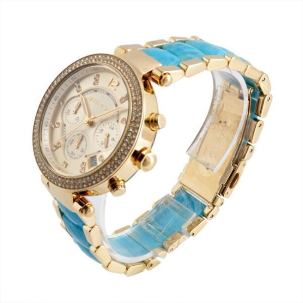 Michael Kors Parker watch angled view showing gold-tone case, blue strap, and chronograph subdials
