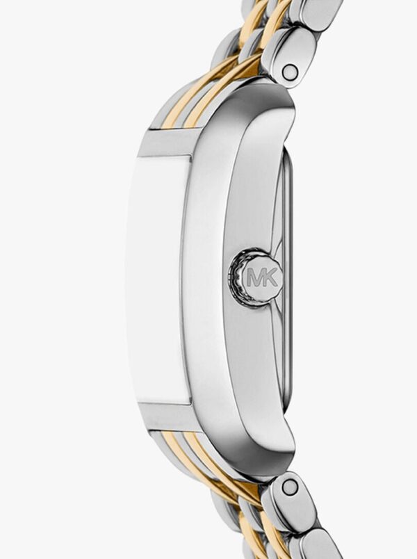 Angle view of Michael Kors Petite Emery watch case and two-tone bracelet detail