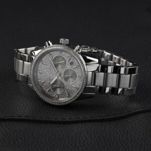 Angled view of Michael Kors Ritz MK7301 silver chronograph watch with diamond bezel