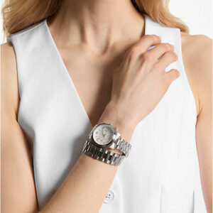 Michael Kors Runway chronograph watch worn on wrist with silver bracelet