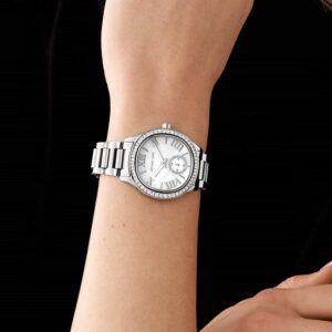Michael Kors Sage watch worn on wrist, showing white dial and silver-tone bracelet