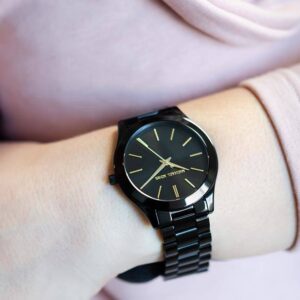 Michael Kors Slim Runway black watch worn on wrist showing face and bracelet fit