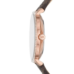 Side profile of Michael Kors Pyper watch showing rose gold case, crystal-set bezel, and brown leather strap
