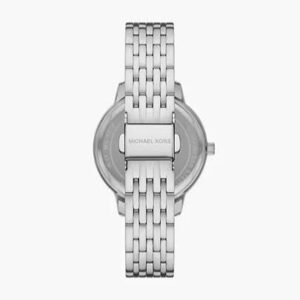 Michael Kors St. Moritz watch case back showing brand marking and link bracelet