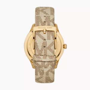 Angled view of Michael Kors Mini Jaycie gold watch with beige patterned canvas strap