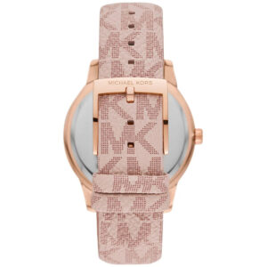 Angled view of Michael Kors Tibby watch displaying rose-gold case, chronograph dial and pink patterned strap