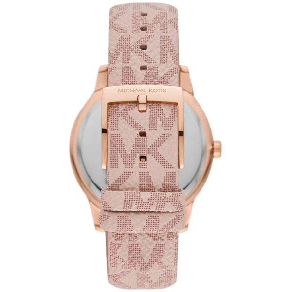 Angled view of Michael Kors Tibby watch displaying rose-gold case, chronograph dial and pink patterned strap