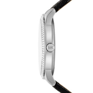 Side view of Michael Kors Tibby watch showing silver case profile with crystal-set bezel and black leather strap