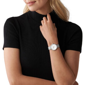 Michael Kors Mini Pyper watch worn on wrist with white dial and silver mesh band
