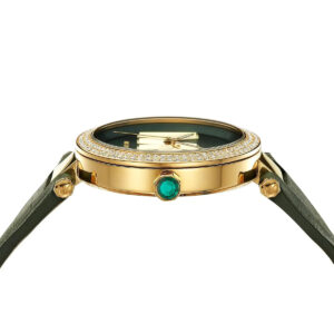 Overhead view of Michael Kors Parker showing dial, gold case, green leather strap, and three-hand movement