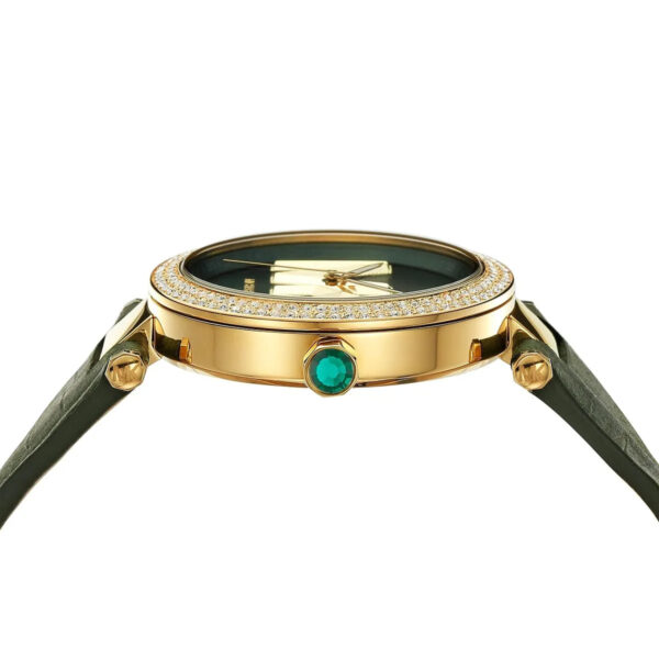 Overhead view of Michael Kors Parker showing dial, gold case, green leather strap, and three-hand movement