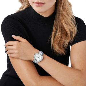 Michael Kors Parker chronograph watch worn on wrist with white dial and blue strap