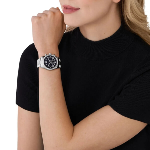 Michael Kors Lexington chronograph women's watch worn on wrist with black dial and crystal bezel